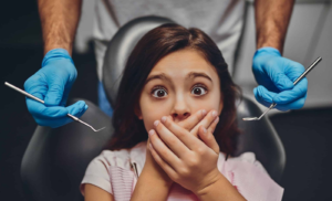 Child feeling anxious before a dental visit.